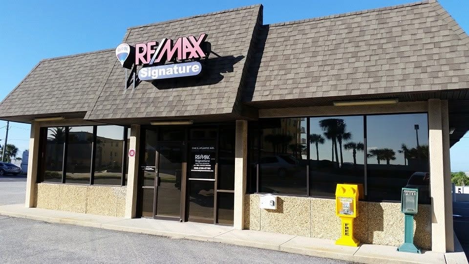 Window film on a RE/MAX Signature real estate office